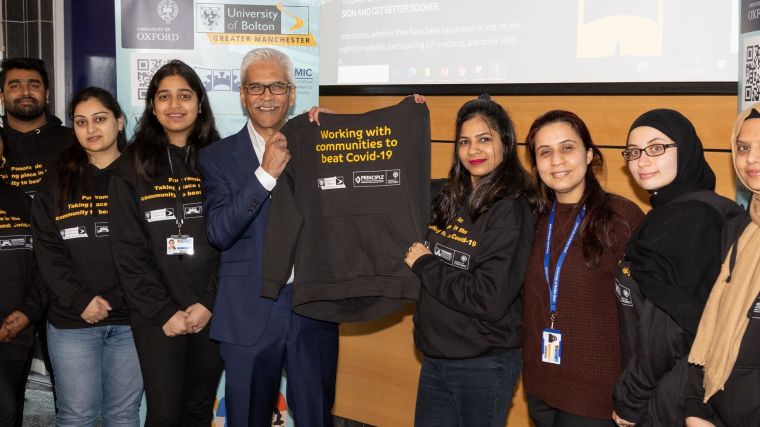 A photograph of Mahendra and a number of the University of Bolton students helping to support PANORAMIC.